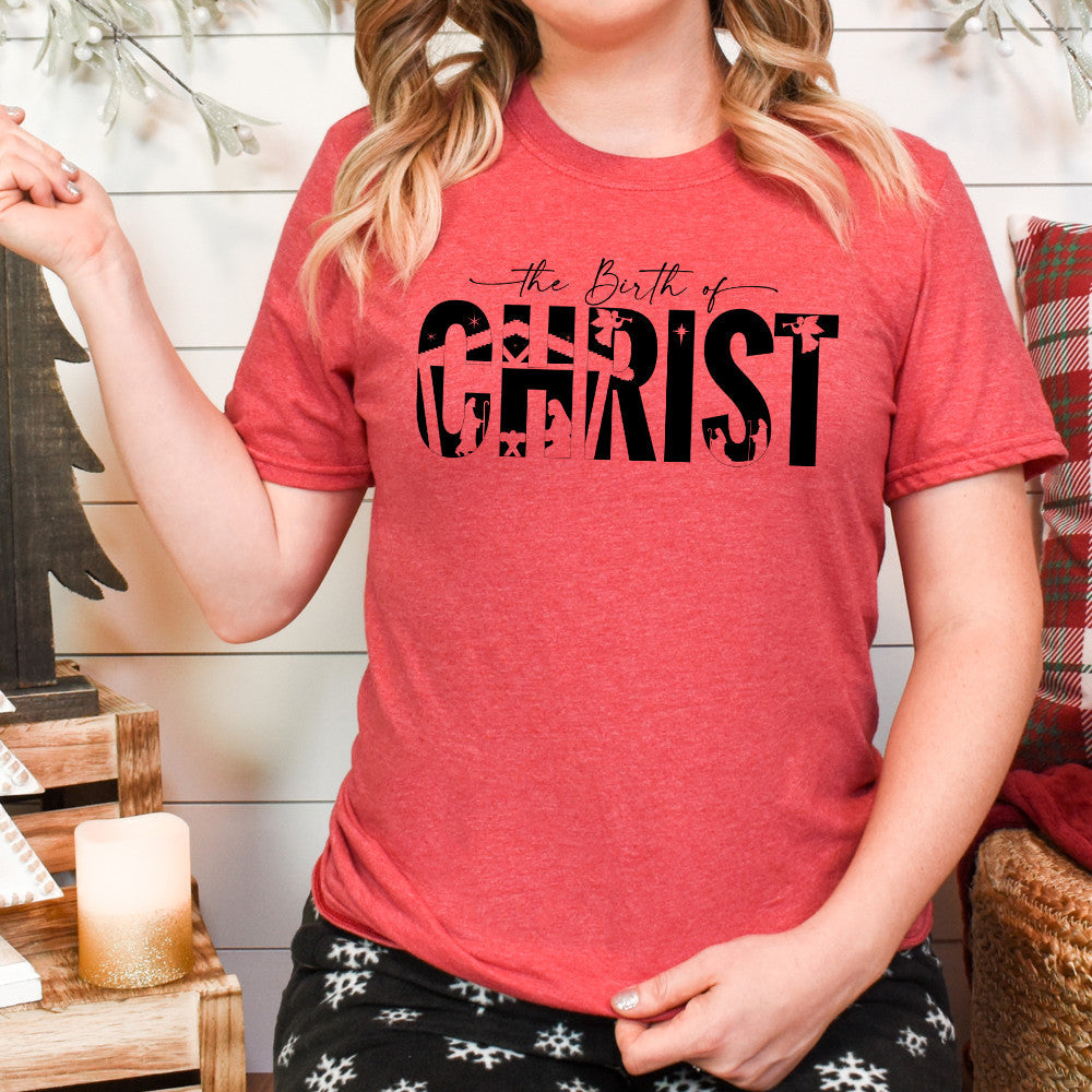 Woman wearing "The Birth of Christ" T-Shirt in Heather Red