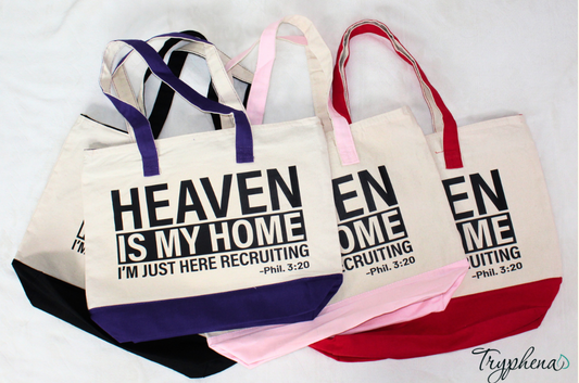 "Heaven is My Home scripture canvas tote bag in Purple Natural, Red Natural,  Pink Natural, Black Natural with zipper compartments and Philippians 3:20 quote"